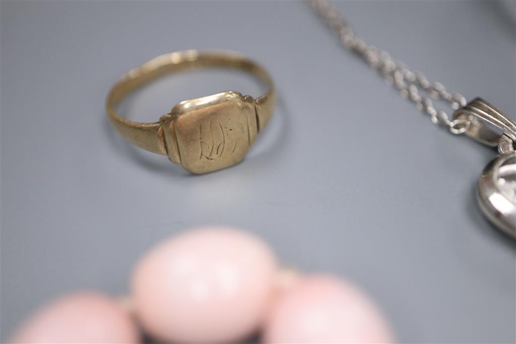 A 9ct gold signet ring, 1.8 grams, a silver bracelet and other costume jewellery.